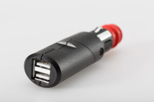092530_ZAL242742.jpg ŁADOWARKA 12V GNIAZDO ZAPALNICZKI ADAPTER DIN PODWÓJNE ZŁĄCZE USB SW-MOTECH
